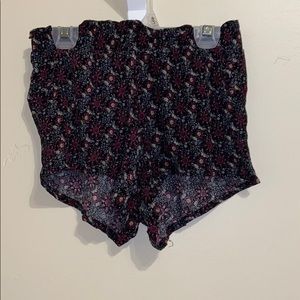 Loose floral shorts.